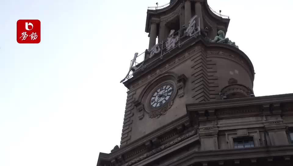 见证上海解放的弹孔听老职工讲述他们与邮政大楼的故事